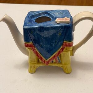 Colorful Teapot with Blue and Yellow Design